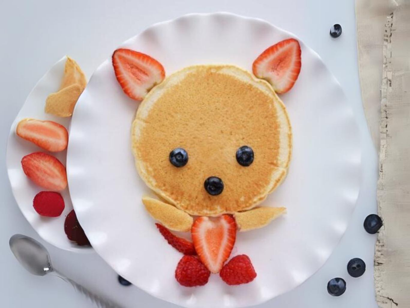 Kids Eating Pancake in the Kids club in the Maldives